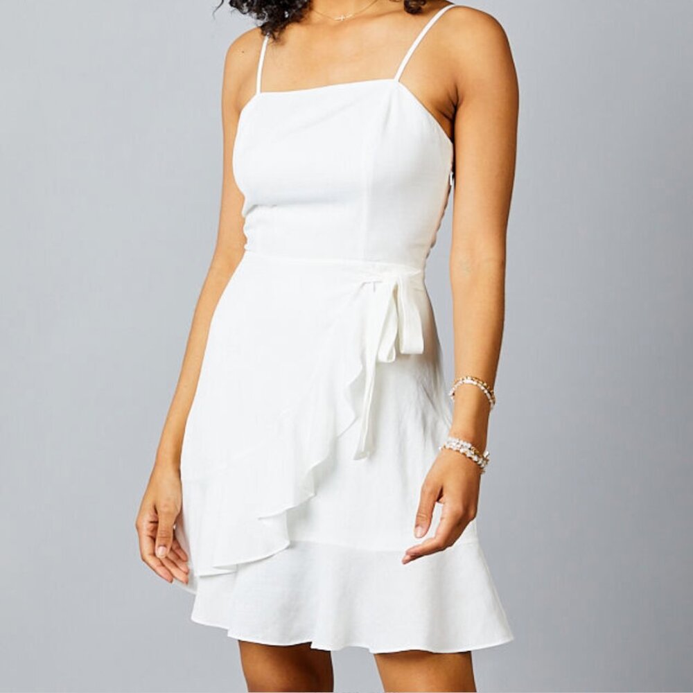 Altar’d State Sleeveless White Ruffle Bottom Tie Front Wrap Mini Dress |
Size S